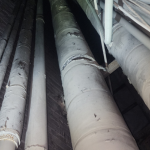 80' Vertical Asbestos Insulated Shafts.